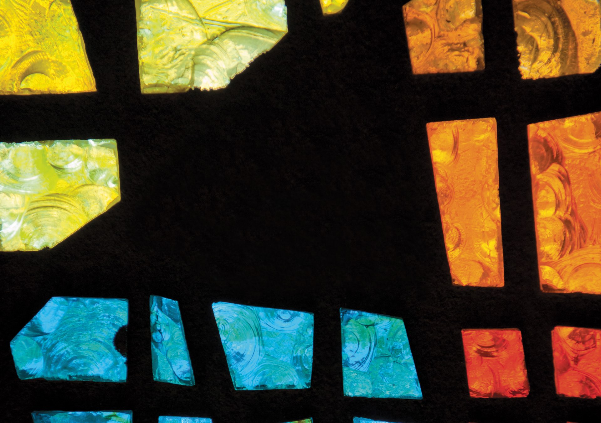 Close-up of colorful stained glass windows.