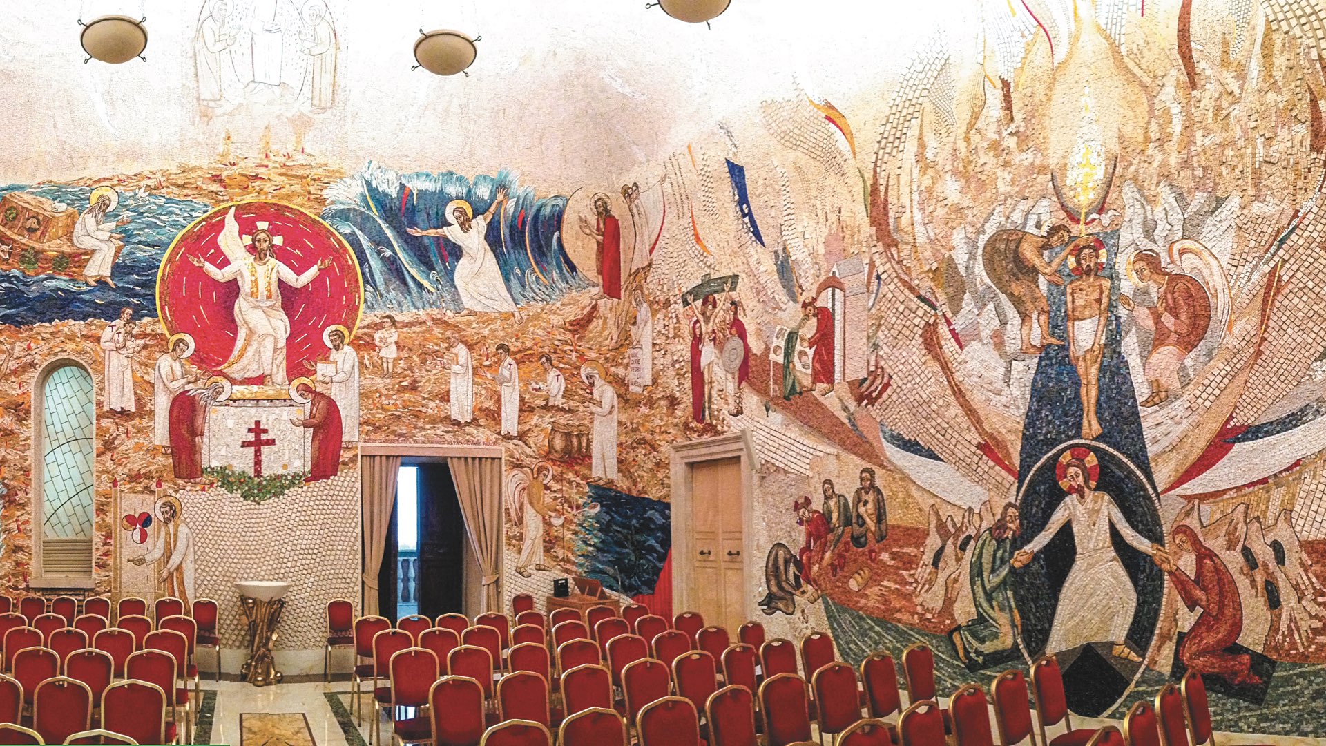 The stunning and vibrant mosaic artwork adorning the walls inside the Redemptoris Mater Chapel at the Vatican