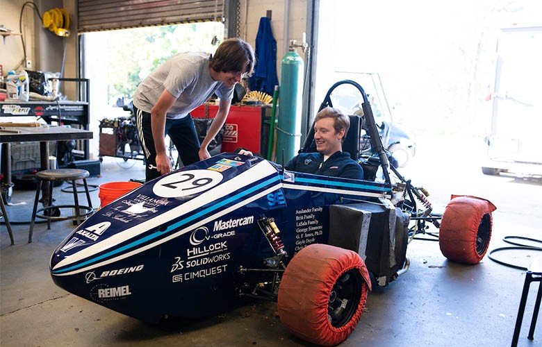 students in race car students in race car