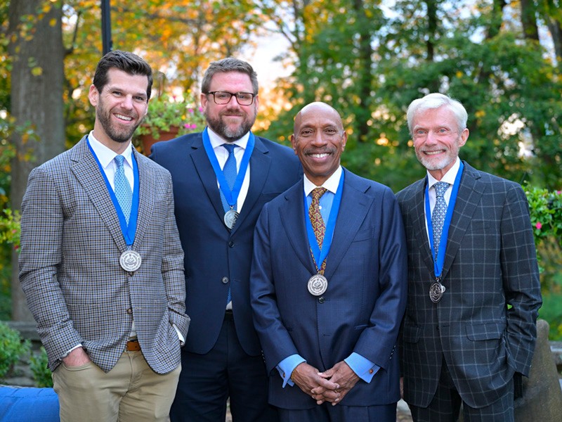 Two adults tending to a garden