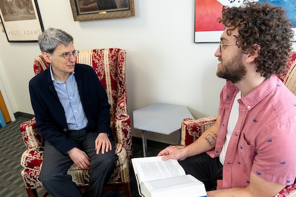 Dr. Julie Klein with a student. Dr. Julie Klein with a student.