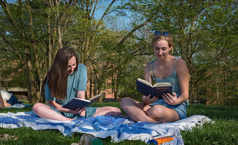 Undergraduate Programs in English Students reading outside