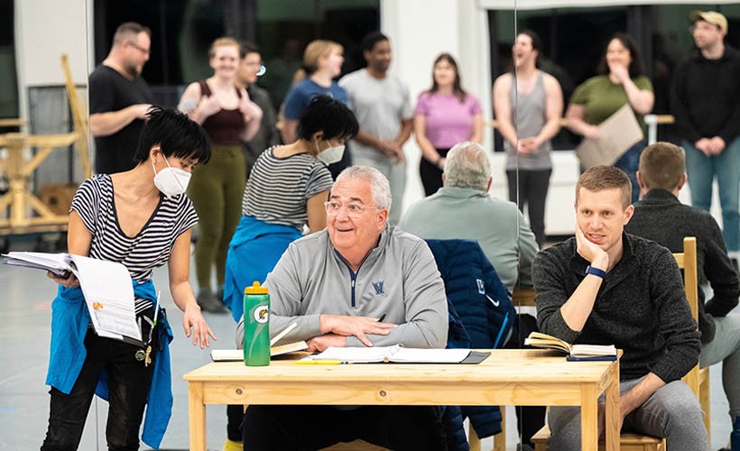 Faculty, staff and students working together during rehearsal Faculty, staff and students working together during rehearsal