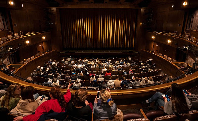 Audience filling up the seats of the Topper Theatre in the Mullen Center for the Performing Arts