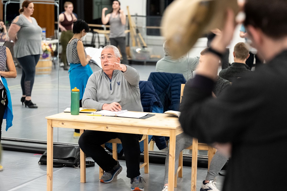 CSP_20220308_0610 Father Peter directing students in theatre rehearsal.