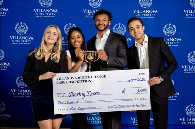 Four Students with Trophy