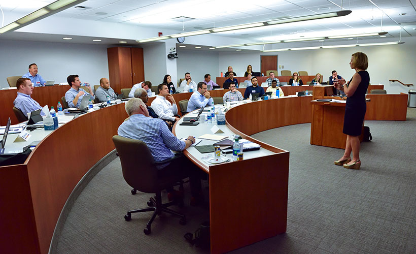 Professor speaks to an EMBA class.