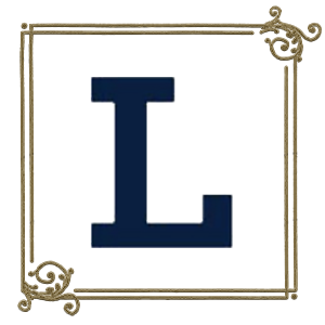 Image of the letter L in a script font with gold filigree surrounding it