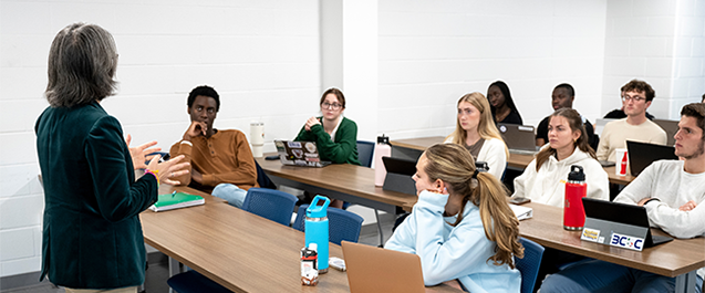 Image of a Villanova faculty member providing instruction to students.