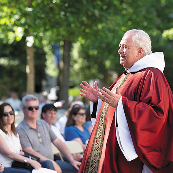 Father Peter celebrates Mass outside 